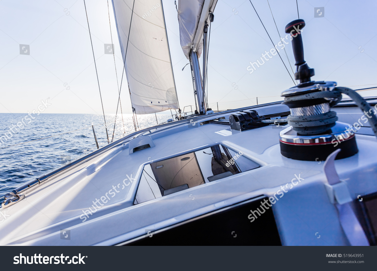 stock-photo-sail-vessel-surfing-on-the-sea-519643951