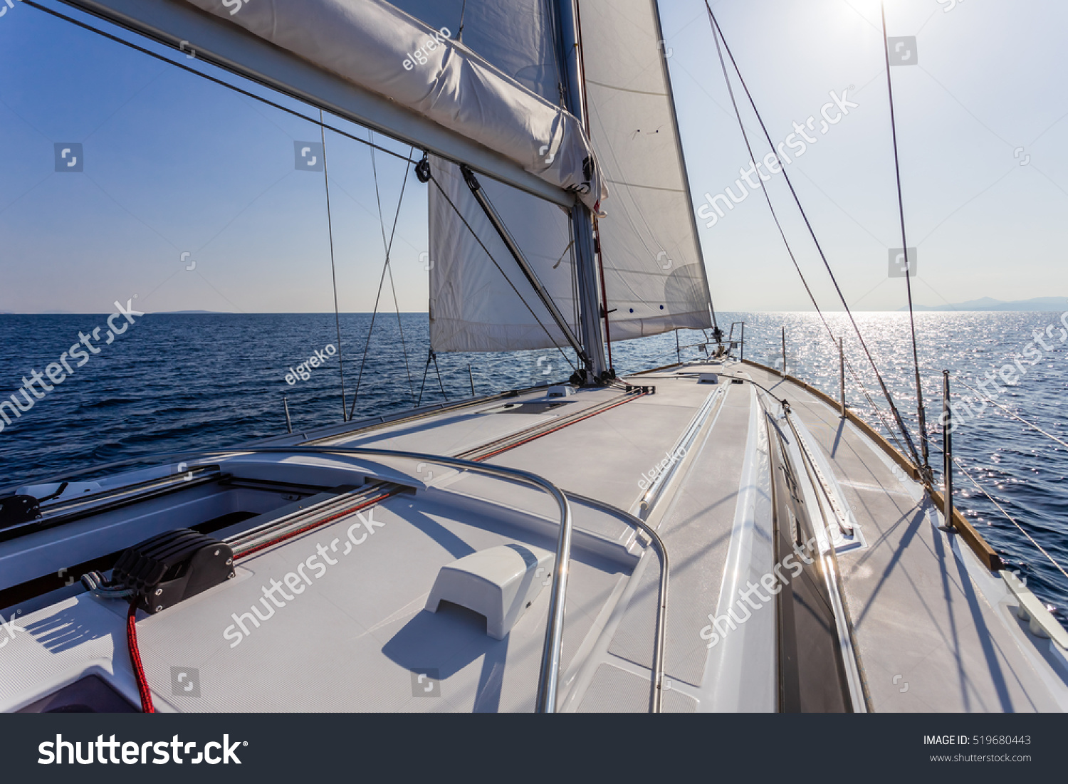 stock-photo-sail-vessel-surfing-on-the-sea-519680443